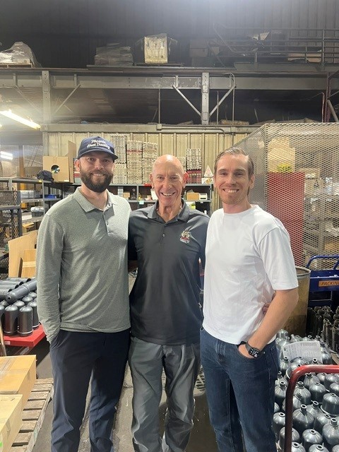 Charlie Hushek with family at Phoenix Heat Treating